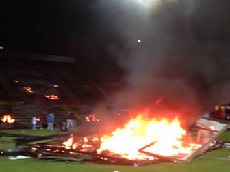 Turkish soccer fans set fire t...
